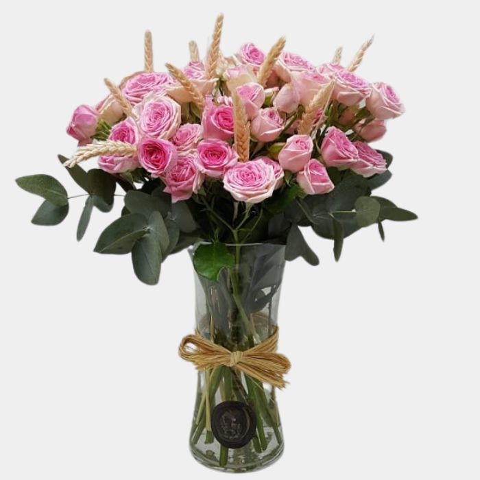 10 Stems Pink Baby Roses in a Glass Vase