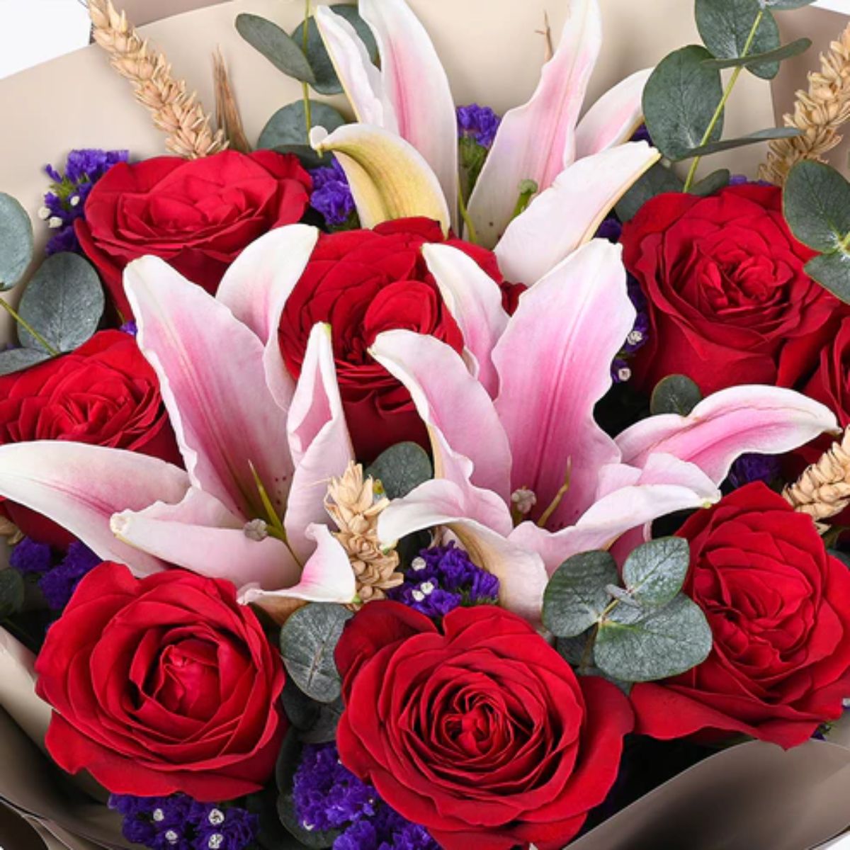 Romantic Red Roses and Lilies Bouquet Elegantly Wrapped