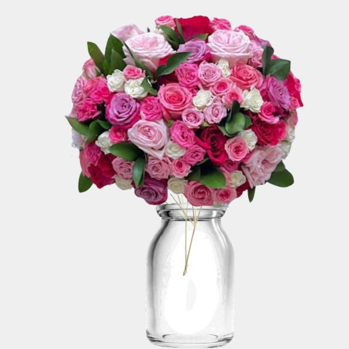 Mixed Pink Roses and Baby Roses in a Vase