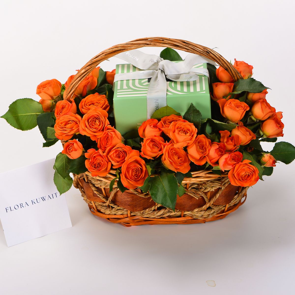 Orange Baby Roses and Patchi Chocolate in Basket