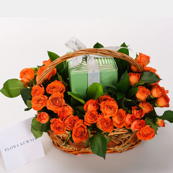 Orange Baby Roses and Patchi Chocolate in Basket | FloraKuwait.com