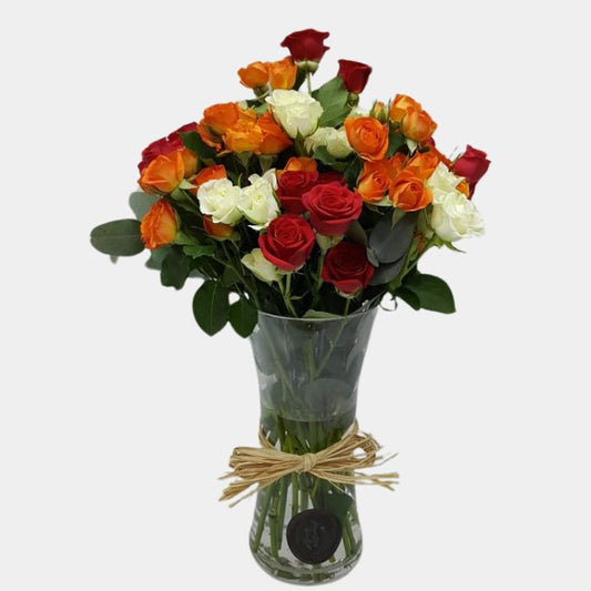 Red, White and Orange Baby Roses in Glass Vase